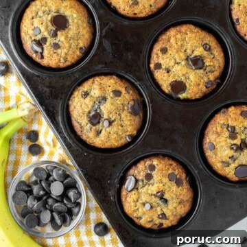 Muffin pan with brown butter banana chocolate chip muffins.
