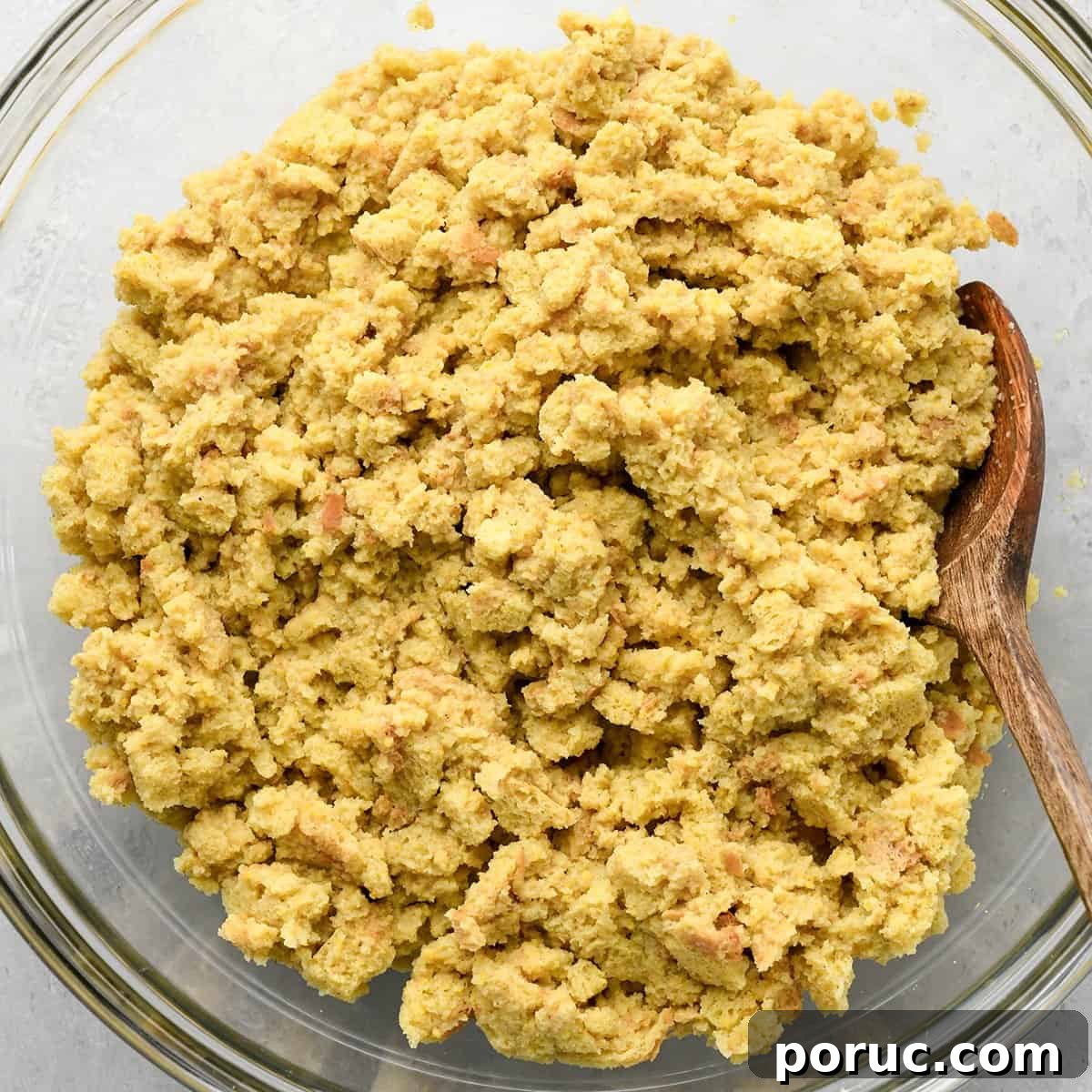 Southern Cornbread Dressing Recipe — Classic Holiday Side Dish 6 packaged cornbread being hydrated with chicken broth in this cornbread dressing recipe