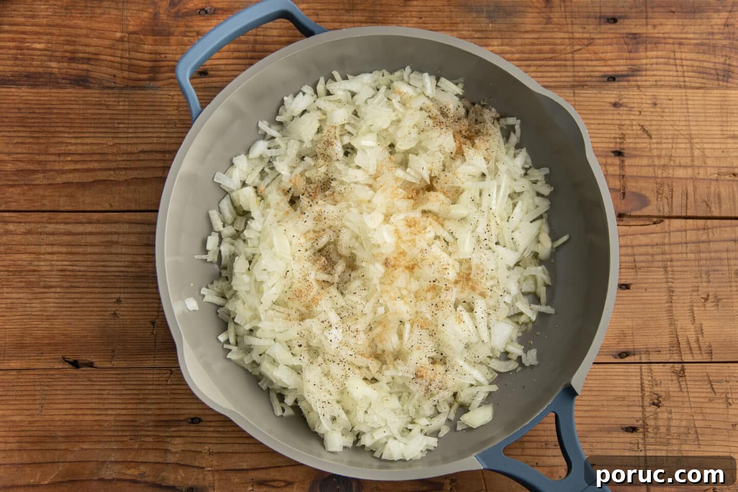 Creamy Caramelized Onion Dip with Greek Yogurt 6 This is a picture of a skillet with the onions and seasoning.