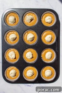 Pumpkin Cream Cheese Muffins with Cinnamon Swirl Recipe 11 pumpkin cream cheese muffins before baking