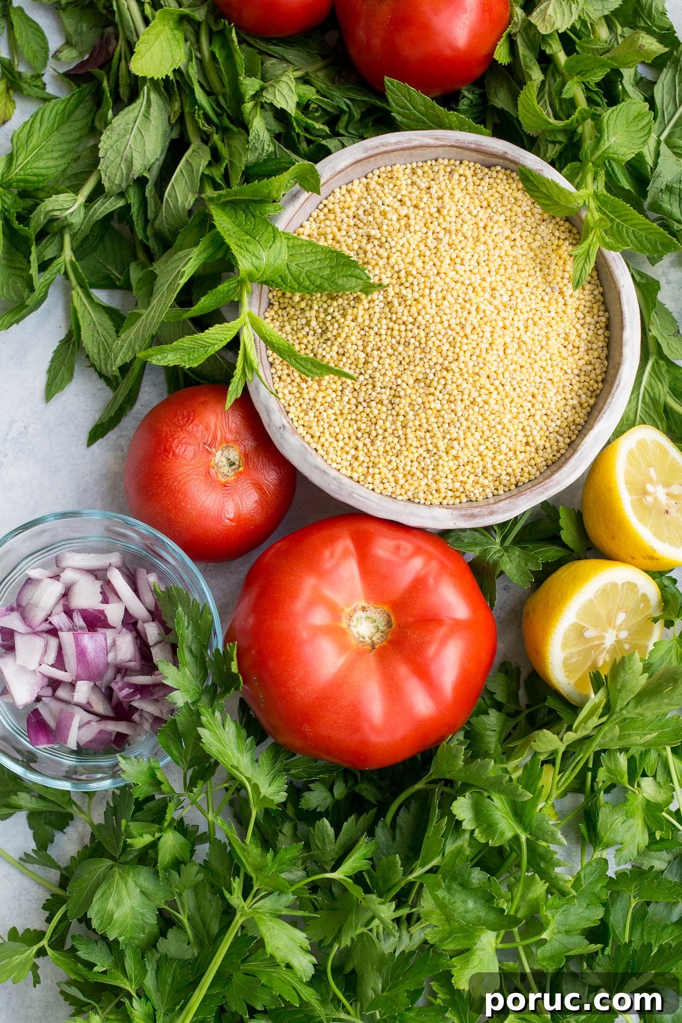 Gluten-Free Vegan Millet Tabbouleh Salad Recipe 3 Vegetables, herbs, and grains on a platter.