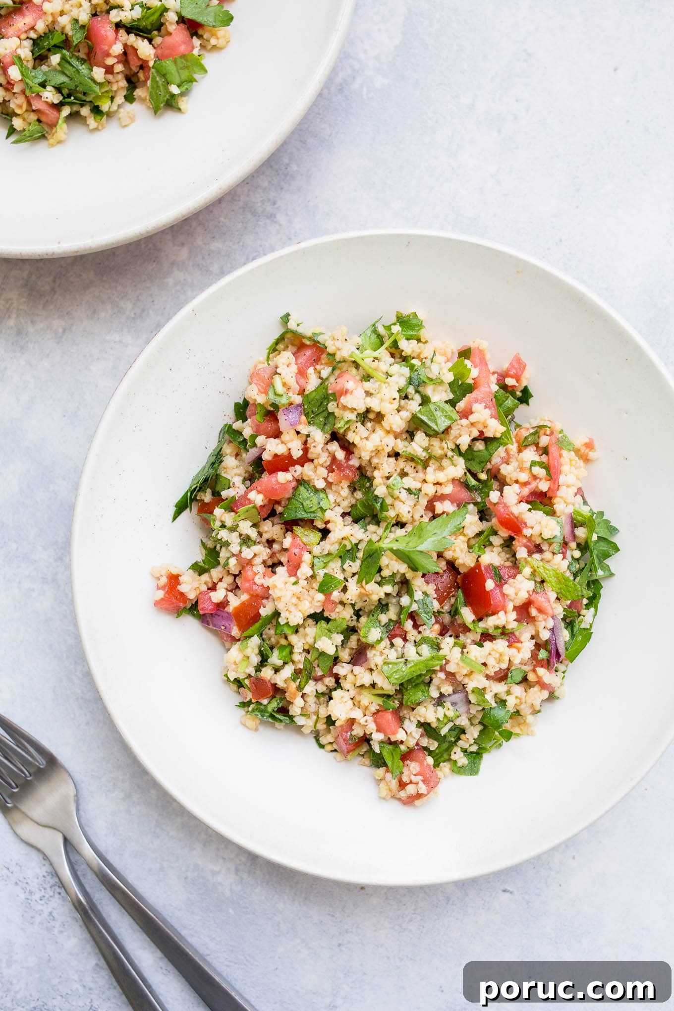 Gluten-Free Vegan Millet Tabbouleh Salad Recipe 5 A serving of tabbouleh in a large bowl.