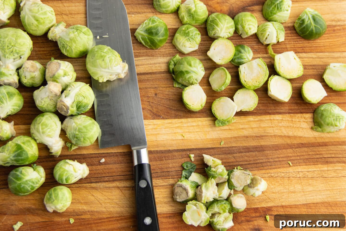 Spicy Honey-Roasted Brussels Sprouts and Carrots 6 This is a picture of Brussels sprouts being chopped.