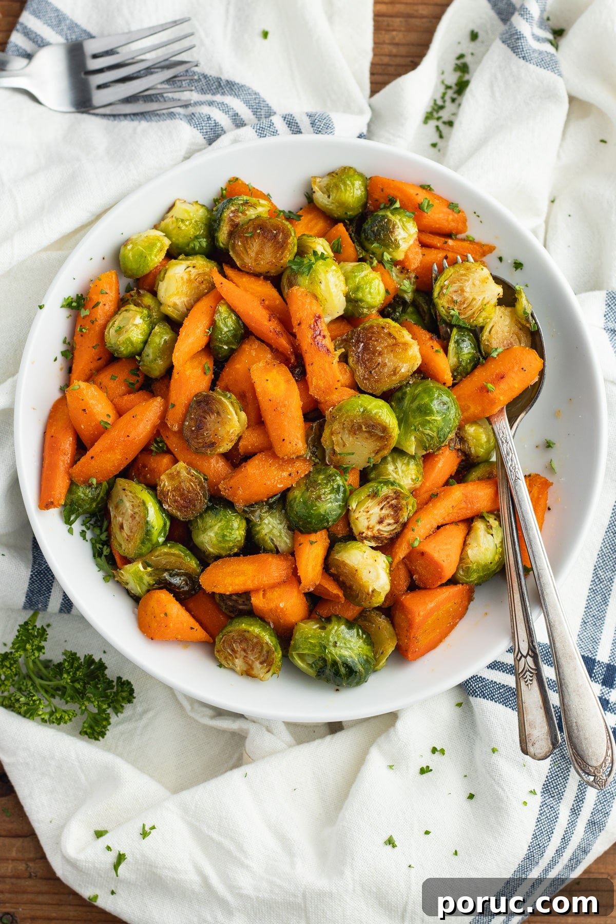 Spicy Honey-Roasted Brussels Sprouts and Carrots 10 This is a picture of a plate filled with roasted Brussels sprouts and carrots with hot honey.