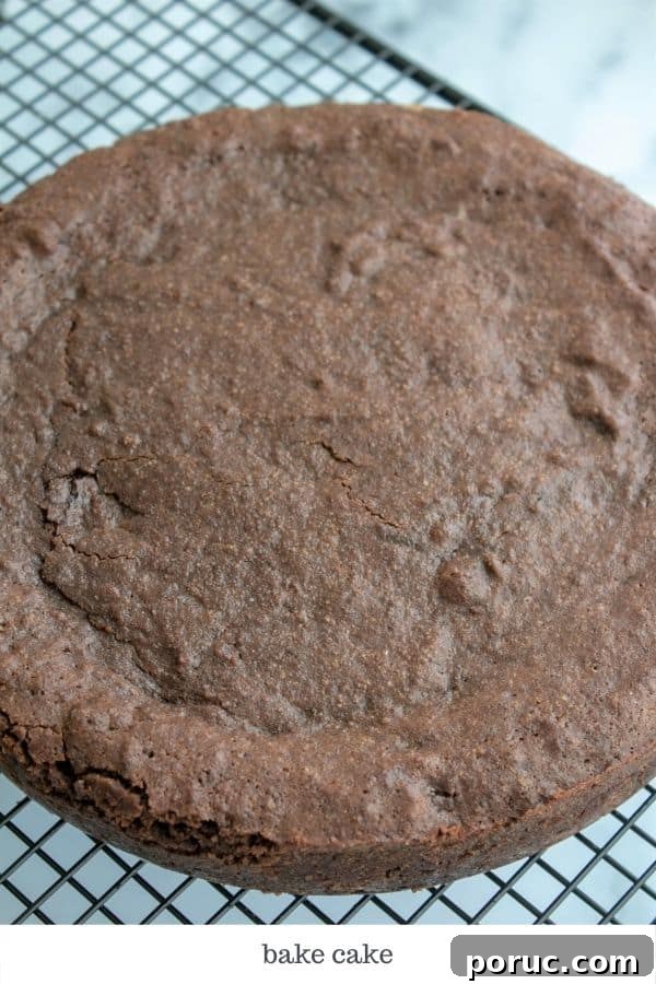 Keto Chocolate Torte Recipe: Rich Low-Carb Chocolate Cake 7 image of baked and cooling cake on a rack