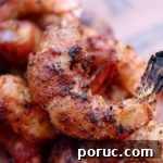 bacon wrapped shrimp on the grill