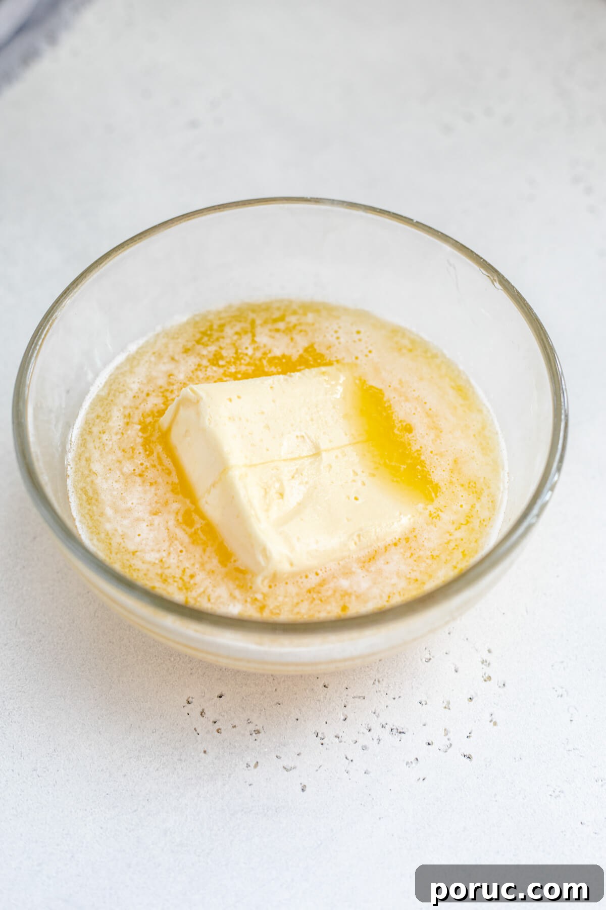 half melted butter in a glass bowl