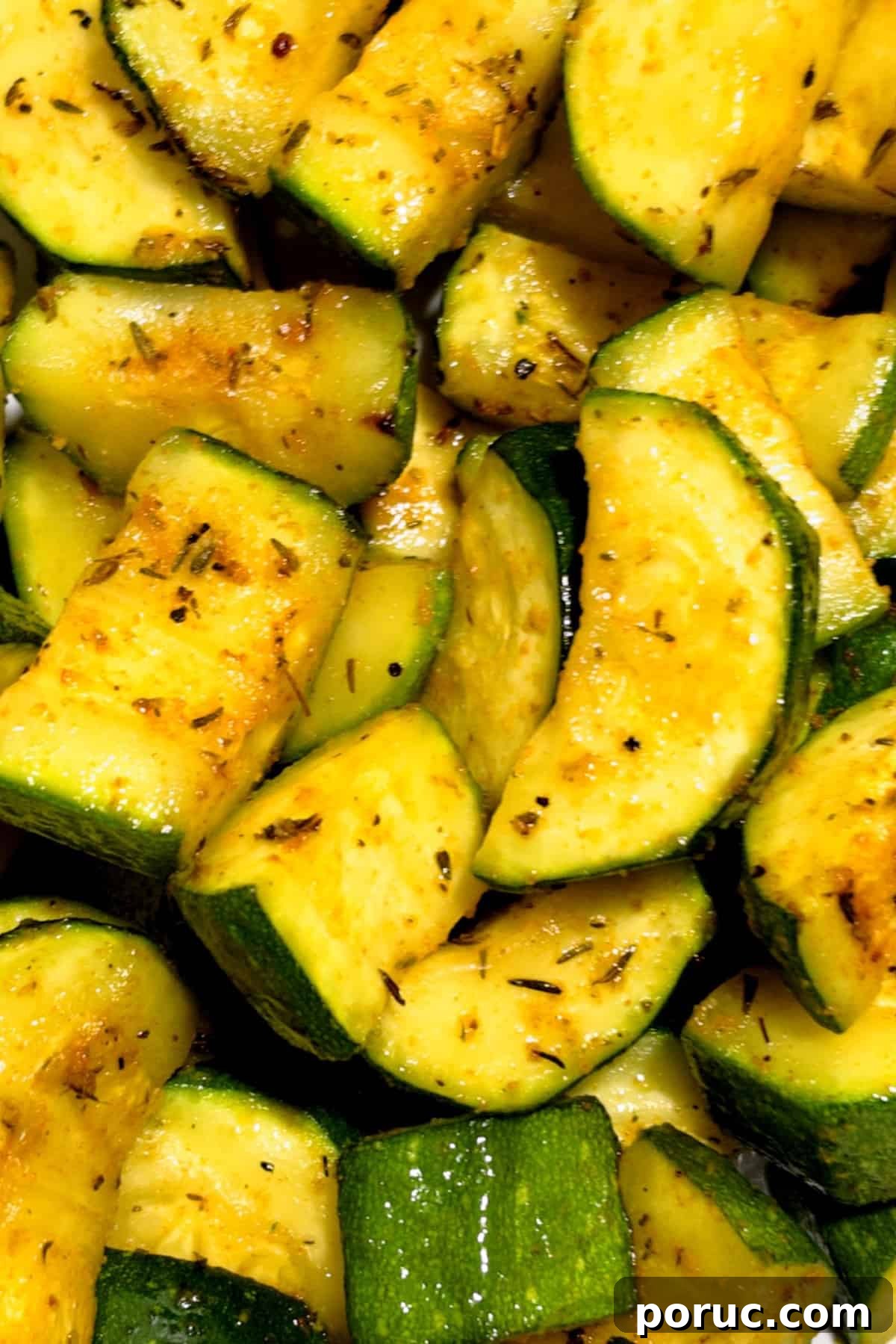 Crispy Air Fryer Zucchini Recipe: Simple Flavorful Side Dish 2 zucchini in the air fryer finished close up picture