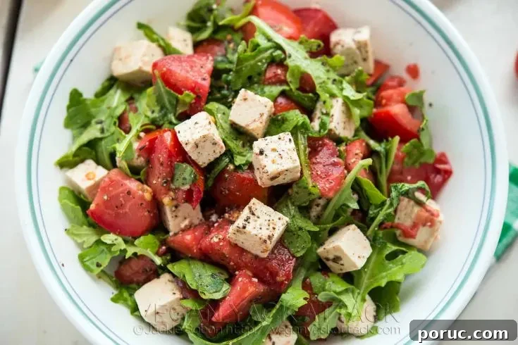 Herbed Tofu Tomato Salad in a white bowl