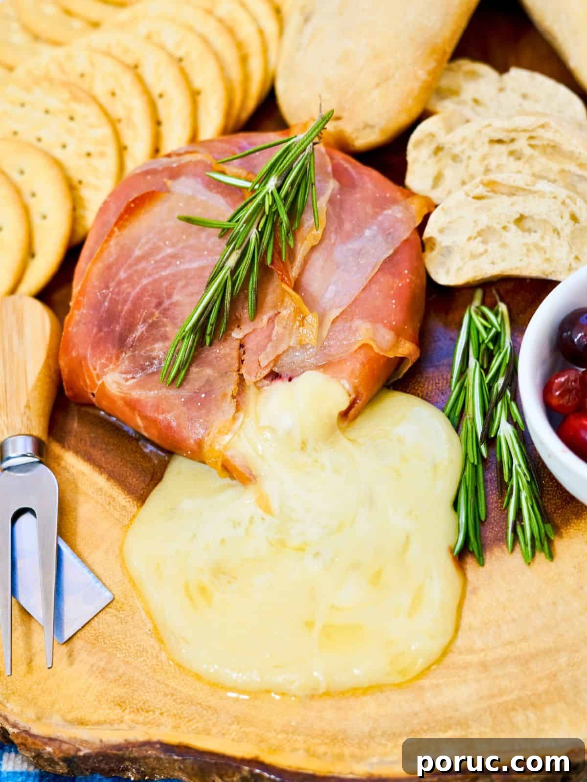 Prosciutto-Wrapped Brie: Baked Appetizer with Honey & Herbs 2 Prosciutto Wrapped Brie.