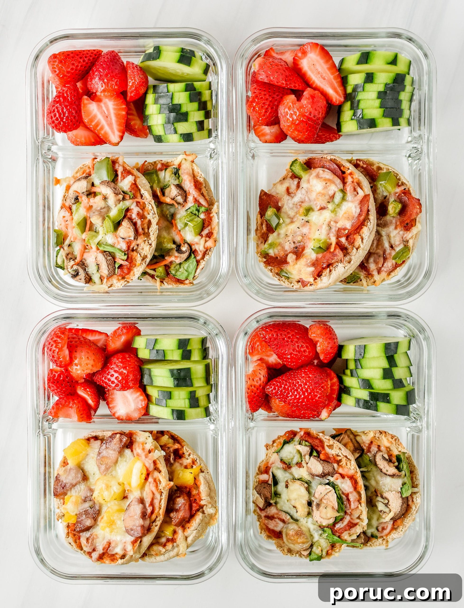 Mini English Muffin Pizzas for Weekly Meal Prep 9 English muffin mini pizzas meal prep pictured from above in meal prep containers with fresh cut strawberries and cucumbers.