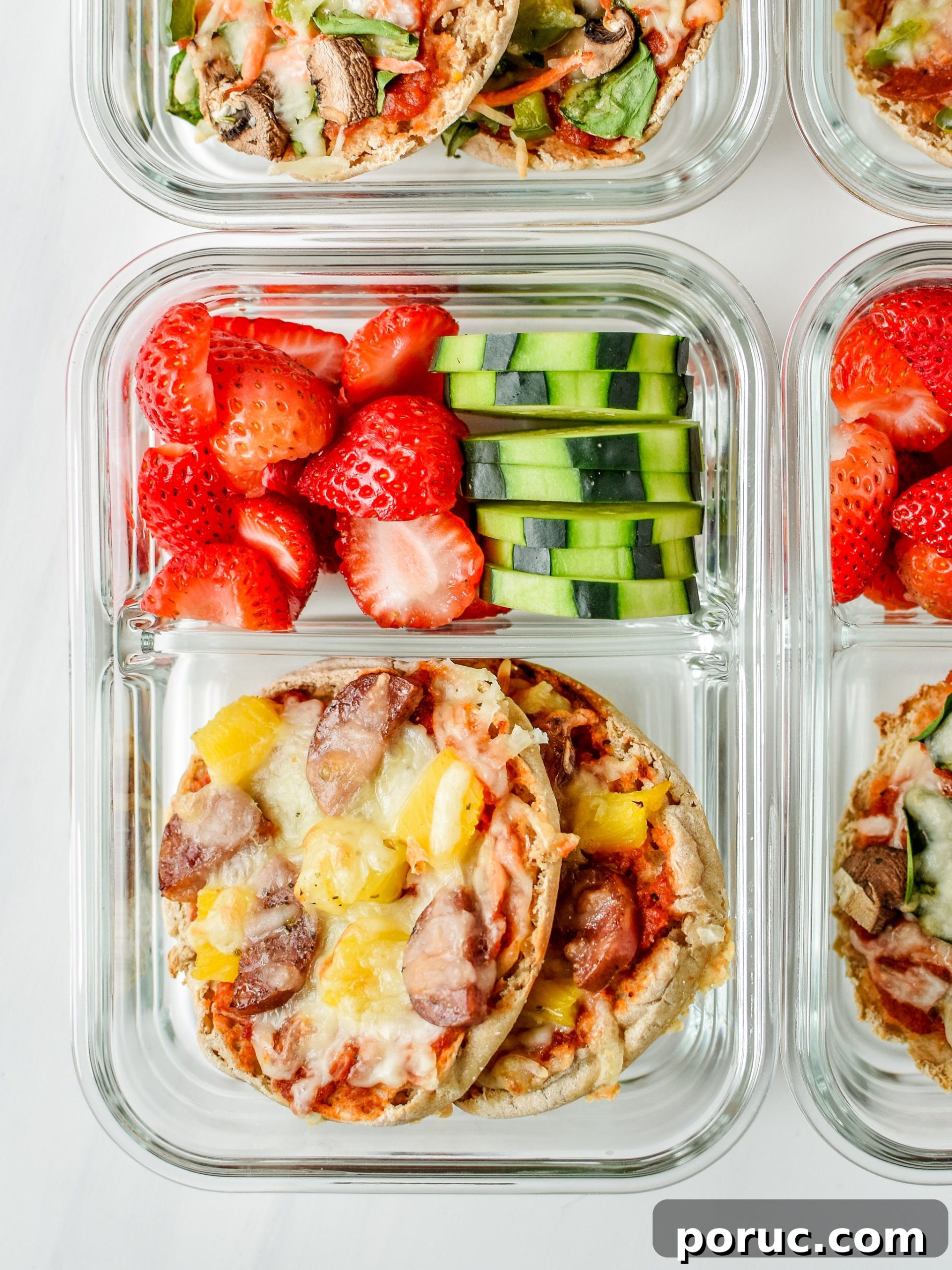 Mini English Muffin Pizzas for Weekly Meal Prep 10 English muffin mini pizzas meal prep - meaty pineapple pictured with fresh cut cucumbers and strawberries