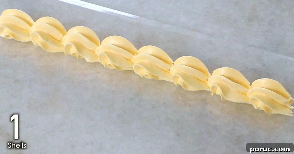 Orange buttercream decorations: small shells