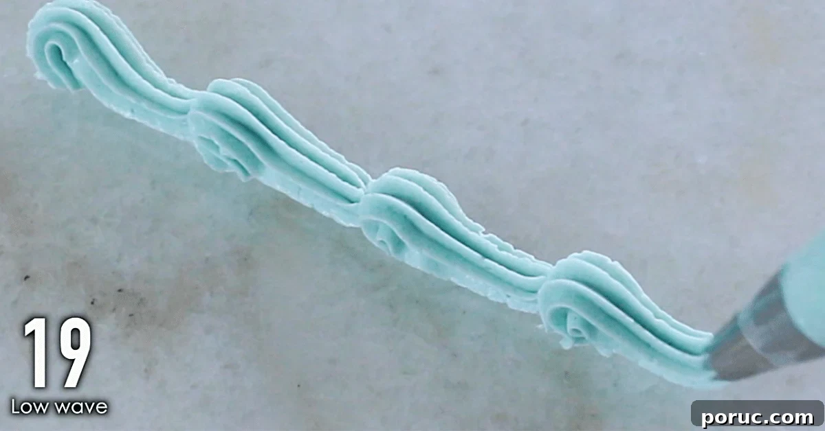 blue buttercream decorations, low waves