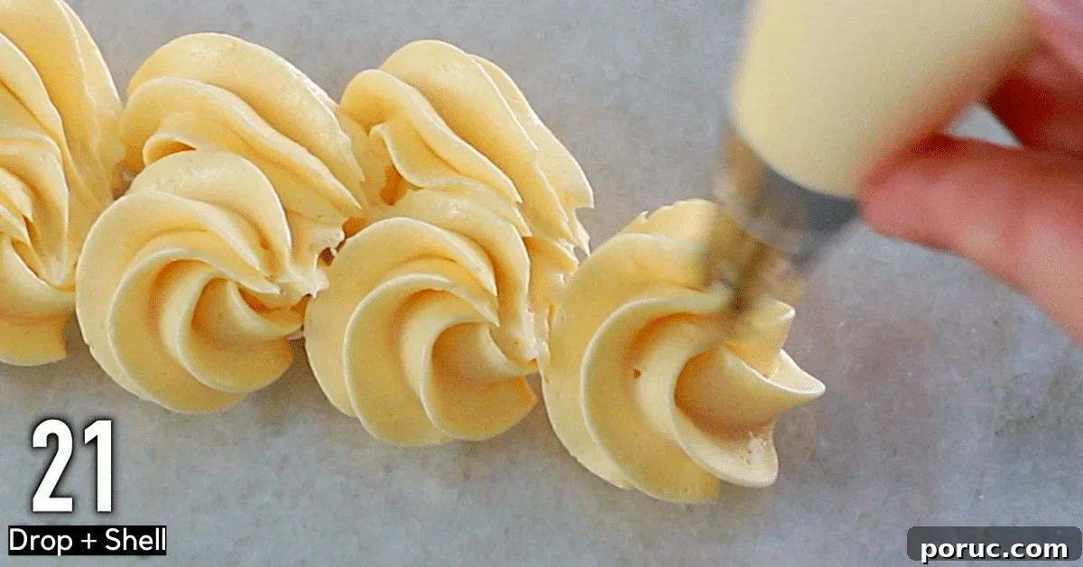 Orange buttercream decorations: swirls and shells