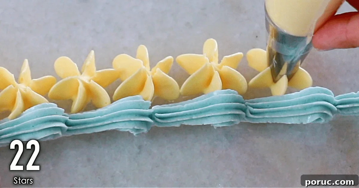 Orange buttercream decorations: stars and blue buttercream decorations, low wave