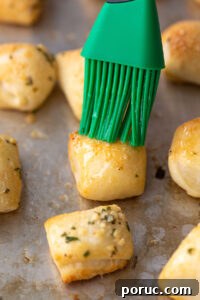 Brushing Garlic Butter on Bread Bites