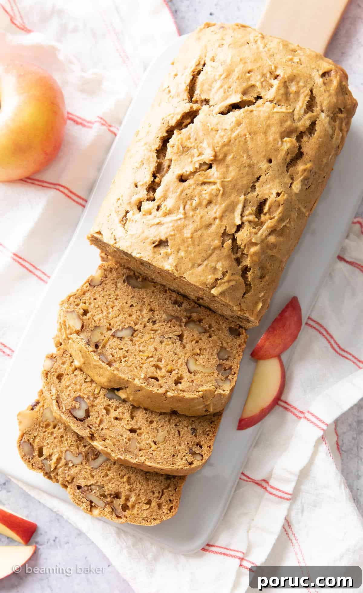 Moist Homemade Apple Bread Recipe for Fall Baking 3 Overhead shot of the apple bread recipe on a serving board with apple slices