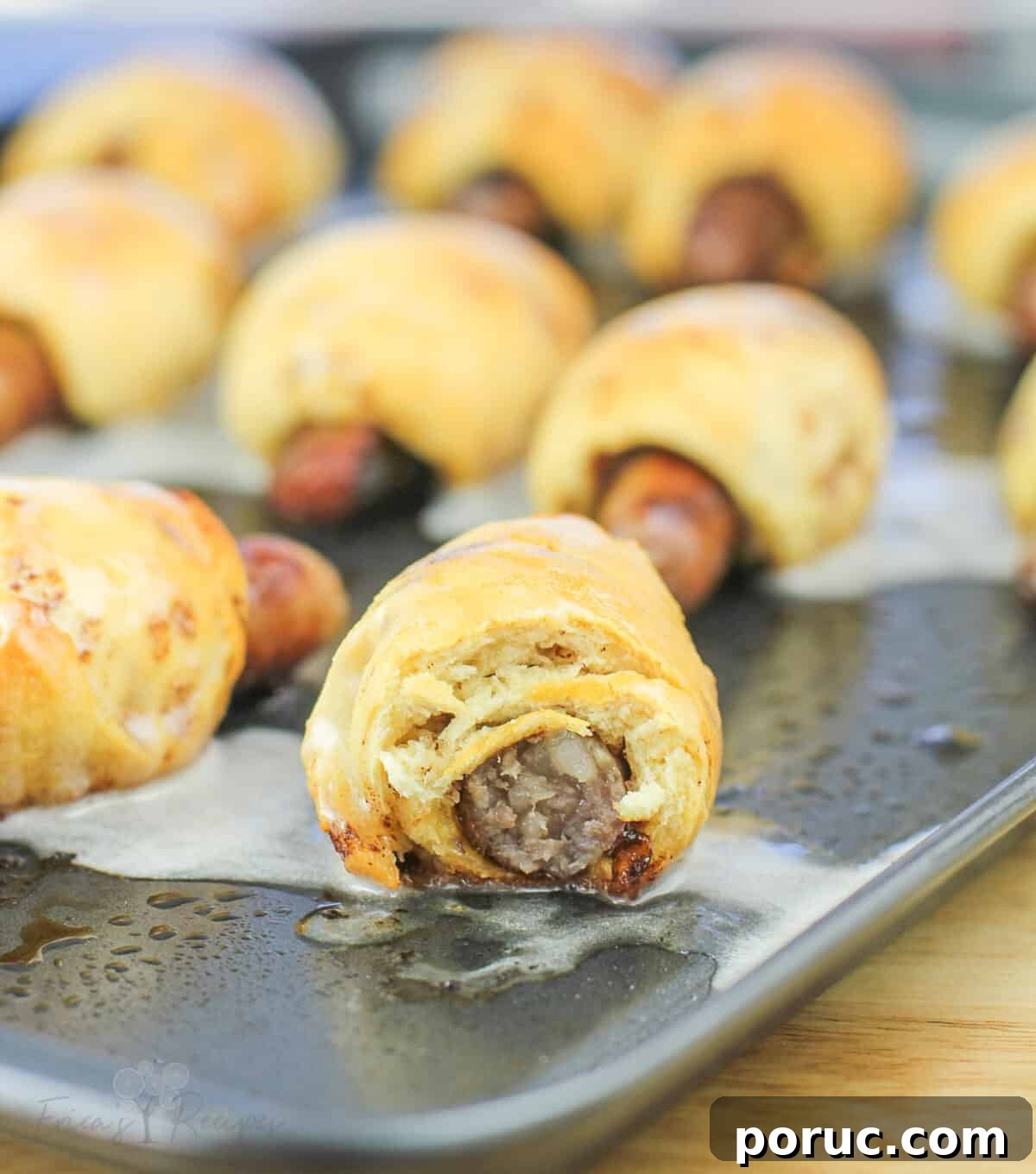 Cinnamon Roll Pig in a Blanket Bites: Sweet Savory Appetizer 3 view of pig in a blanket cross section
