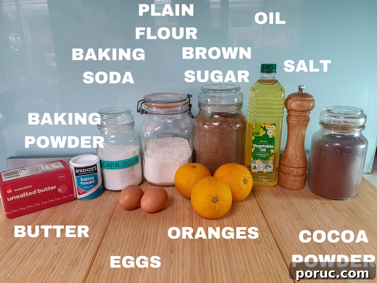 Chocolate Orange Cupcakes with Zesty Orange Glaze 3 Ingredients: butter, baking powder, baking soda, eggs, plain flour, oranges, brown sugar, oil, salt, cocoa powder.