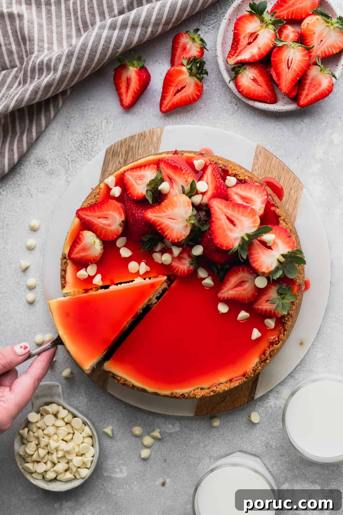 Pulling a slice out of cheesecake.