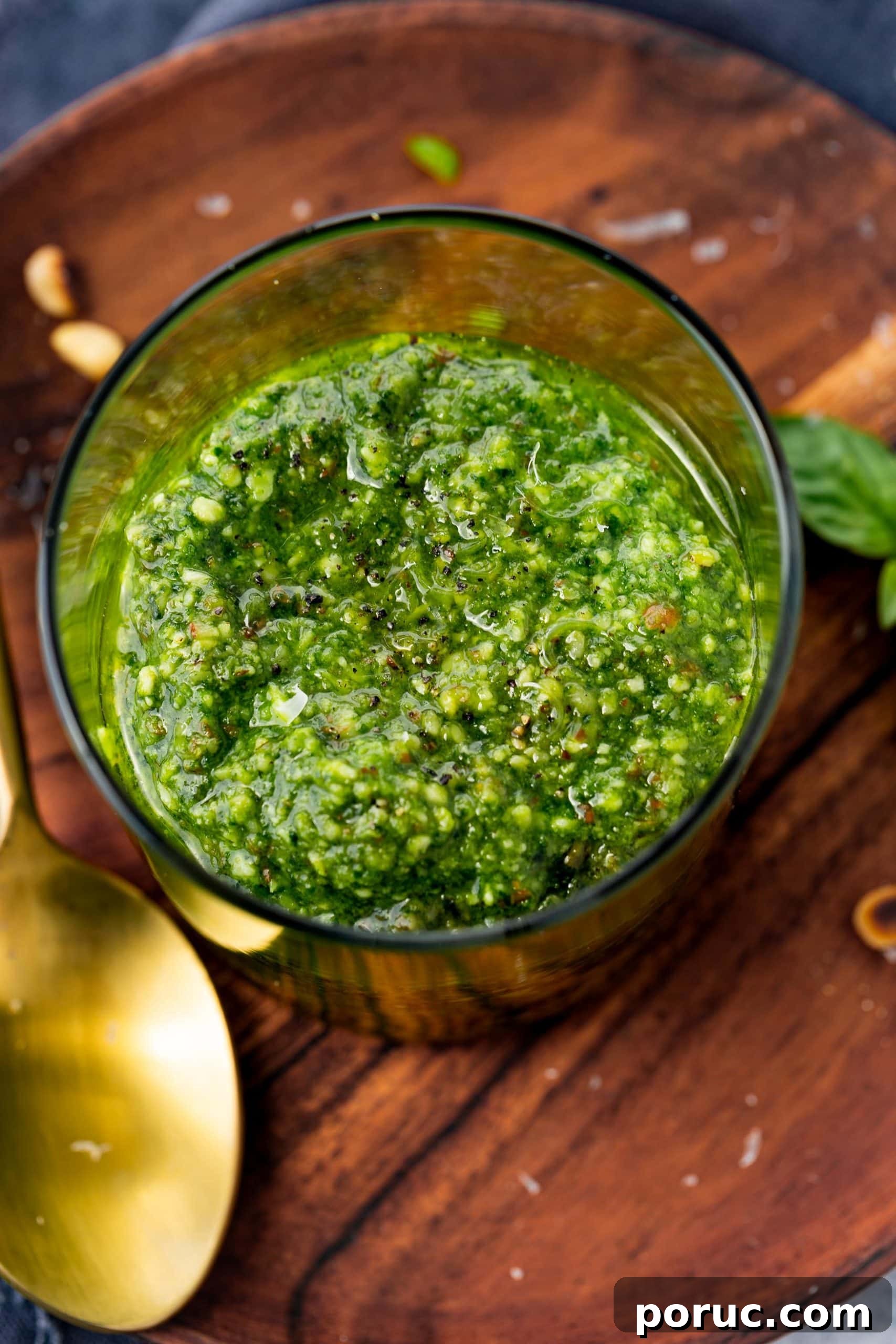 Homemade Classic Basil Pesto Recipe for Pasta & Sandwiches 3 A photo of a jar of homemade pesto taken from above the jar.