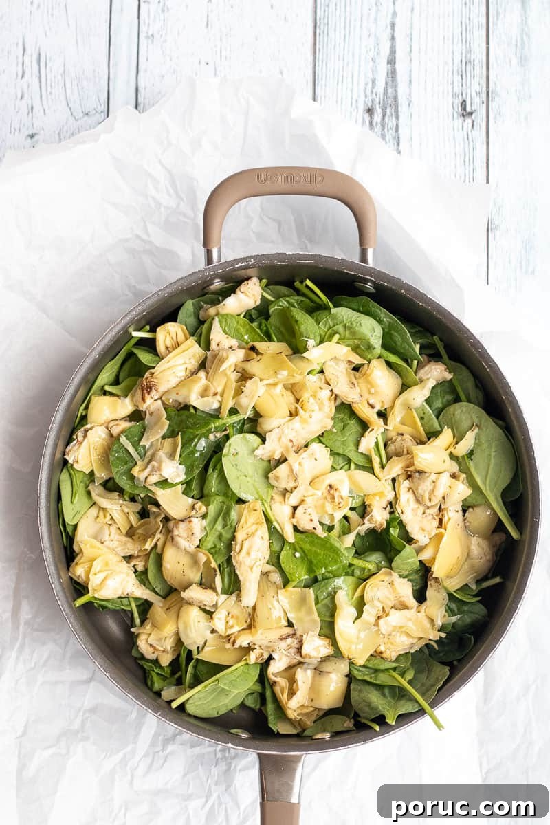 Spinach and Artichoke Pasta Bake with 7 Simple Ingredients 7 spinach and artichoke in a sautee pan