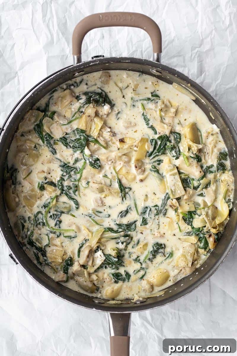 Spinach and Artichoke Pasta Bake with 7 Simple Ingredients 9 pasta sauce mixed up with spinach and artichoke