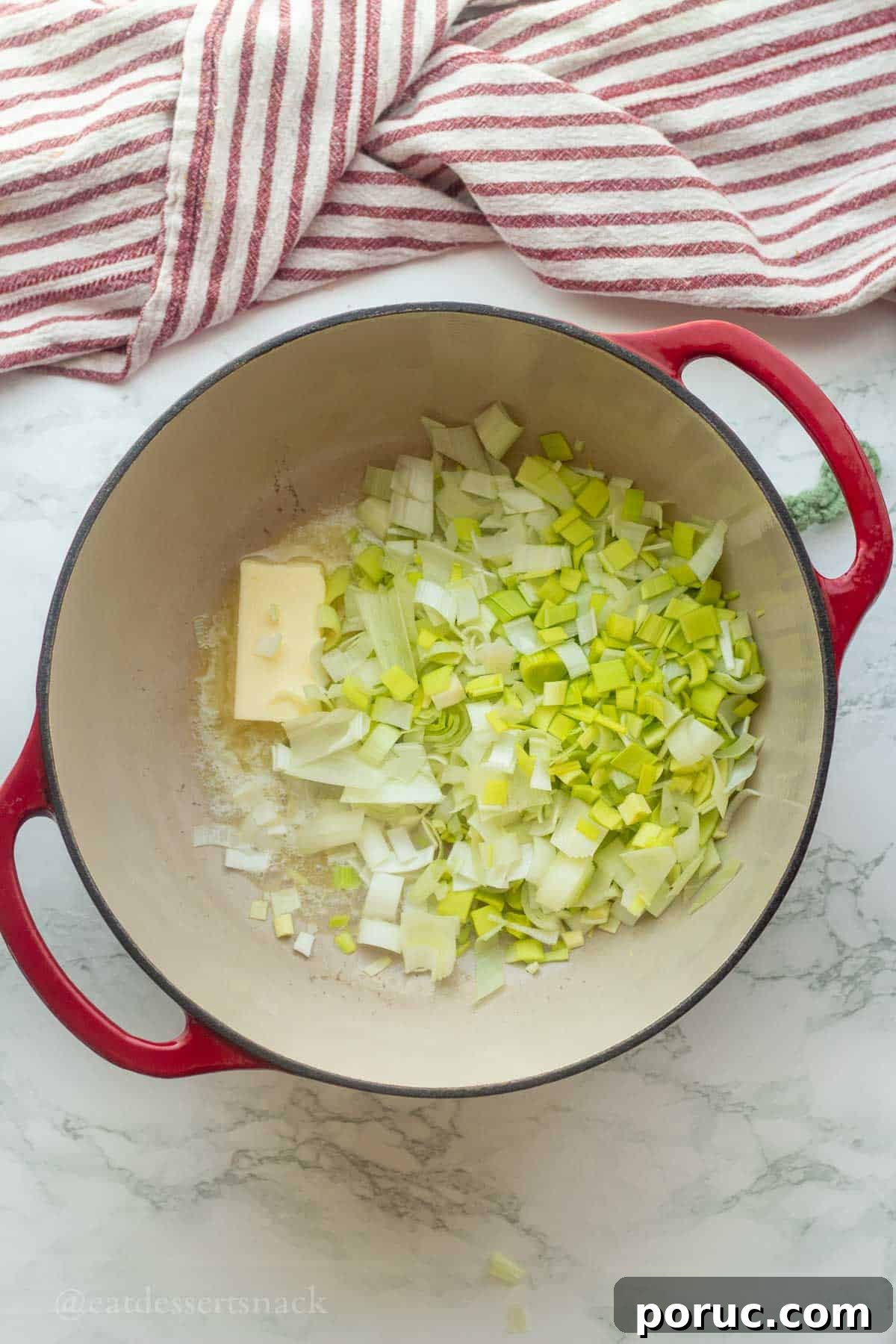 Creamy Potato, Leek & Cauliflower Soup Recipe 4 Butter and leeks in soup pot.