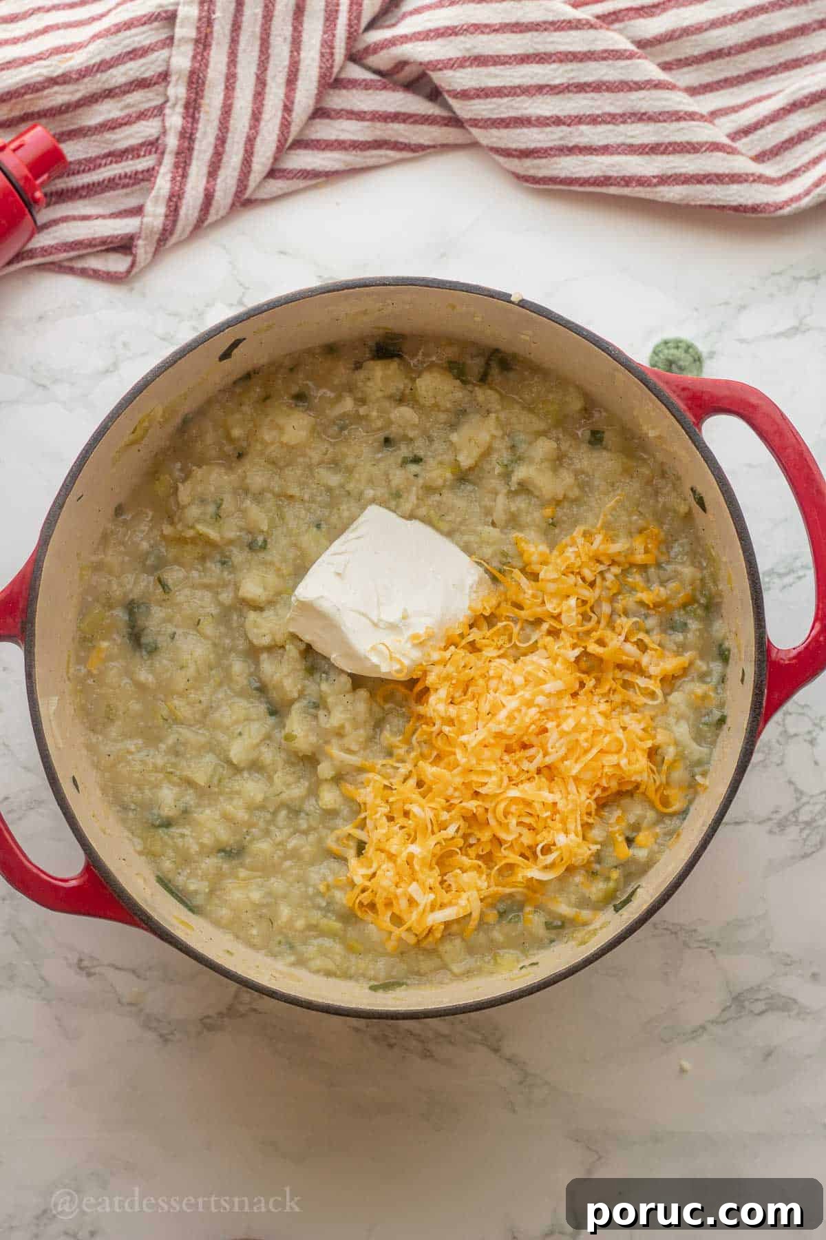 Creamy Potato, Leek & Cauliflower Soup Recipe 8 Mashed cauliflower and potatoes with cream cheese and cheddar on top.