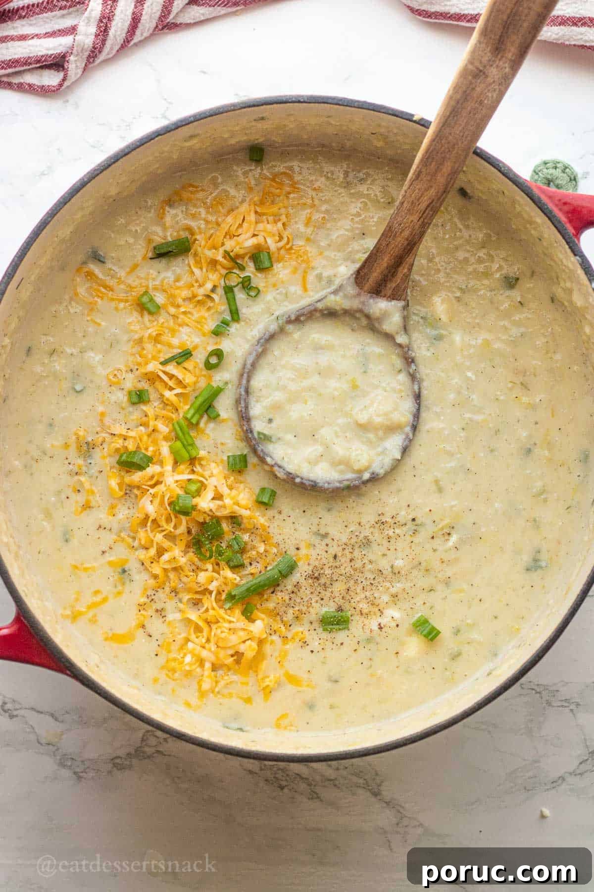 Creamy Potato, Leek & Cauliflower Soup Recipe 10 Creamy cheesy potato soup with green onions in a red cast iron skillet. Comforting and delicious for all seasons.