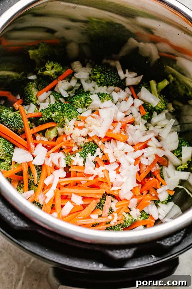 Chopped vegetables in an instant pot.
