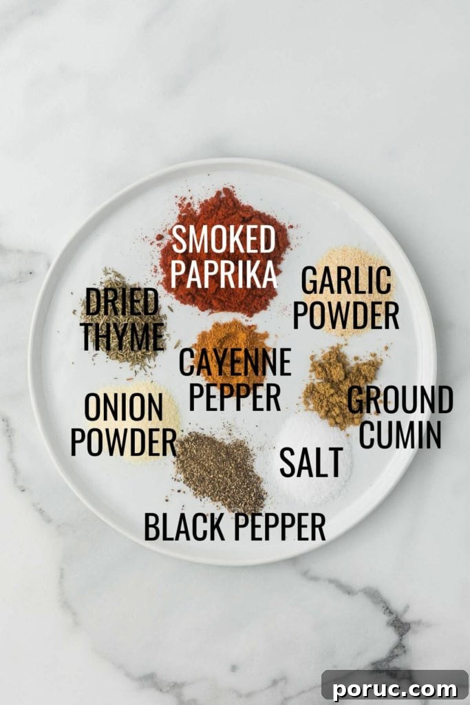 Quick 3-Minute Homemade Blackening Seasoning Mix for Bold Flavor 4 ground spices on a white plate